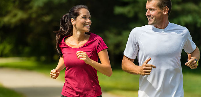 Husband and Wife out on a jog follow health advice from Concord chiropractor