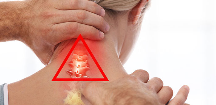 Concord chiropractor adjusting woman's neck for whiplash