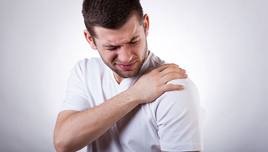 Man suffering from frozen shoulder before visiting Concord chiropractor