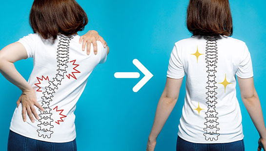 Woman with good posture after chiropractic treatment from Concord chiropractor